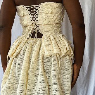 The back of Thato crochet 2-piece skirt and top